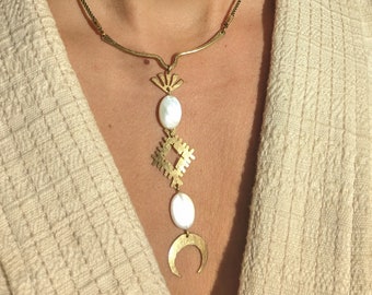 Mother-of-pearl and brass talisman