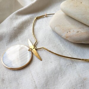 Moon necklace in mother-of-pearl and brass