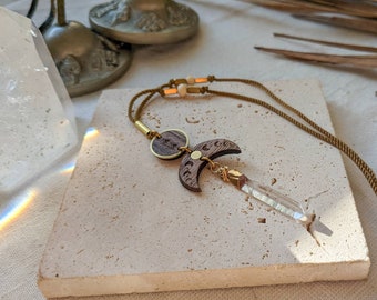 Moon and quartz necklace, in walnut wood and brass