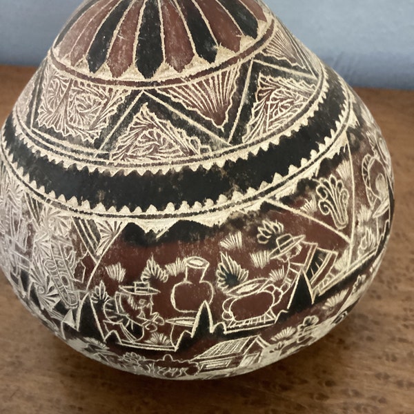 Hand carved story Gourd from Peru