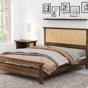 This is a handmade wood bed frame. The bed frame is shown in solid walnut and curly maple.  The curly maple headboard is inlaid with curved contrasting wood pieces that look like river rushes.  The bed is shown with matching nightstands.