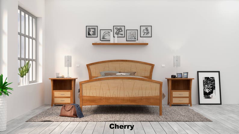 This is a handmade wooden bed with a curved headboard and footboard.  The headboard and footboard are inlaid with curved wood pieces that look like river rushes.  The bed is made with cherry and curly maple wood.