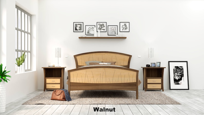 This is a handmade wooden bed with a curved headboard and footboard.  The headboard and footboard are inlaid with curved wood pieces that look like river rushes.  This picture shows the bed in walnut and curly maple wood.