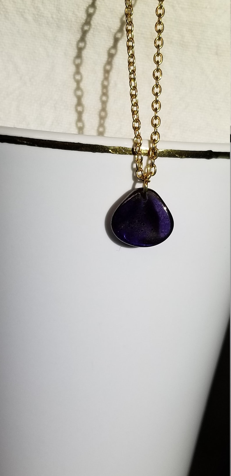 Semi-translucent purple rose petal necklace
