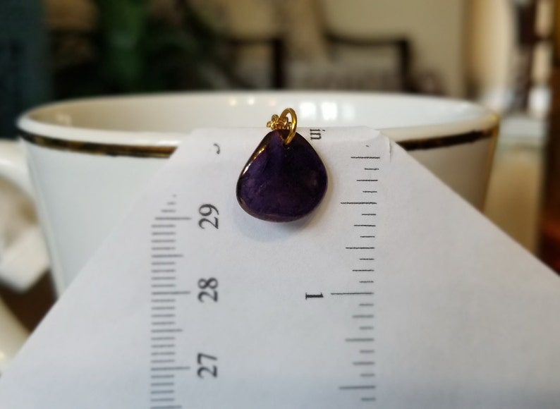 Semi-translucent purple rose petal necklace