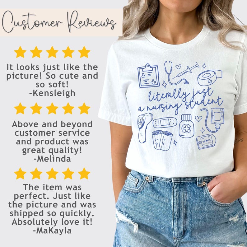 May include: White t-shirt with a blue graphic design that says "literally just a nursing student". The graphic includes medical symbols like a stethoscope, thermometer, bandages, and a heart.