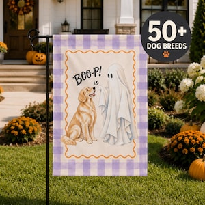 May include: A rectangular garden flag featuring a light purple and white gingham border. The center displays a golden retriever sitting next to a white ghost with the text BOO-P! above them. The design is enclosed by an orange wavy line border.