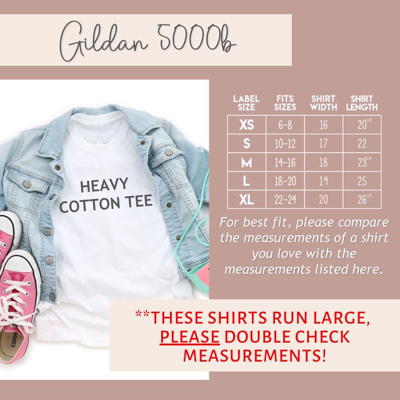 May include: White Gildan 5000b t-shirt with the text "Heavy Cotton Tee" printed on the front. The shirt is laid flat on a surface with a denim jacket and pink sneakers. A size chart is shown with the label size, fits sizes, shirt width in inches, and shirt length in inches.