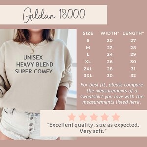 May include: A beige unisex heavy blend sweatshirt with the text "UNISEX HEAVY BLEND SUPER COMFY". The image includes a size chart with measurements in inches. The sweatshirt is shown with denim shorts. The text "Excellent quality, size as expected. Very soft." is also included.