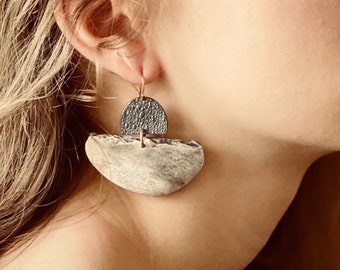 Sexy gorgeous silver earring. SLICE. Organic. Handmade. Distinctive and elegant statement. Quality materials. Allergy free gold ear wire.