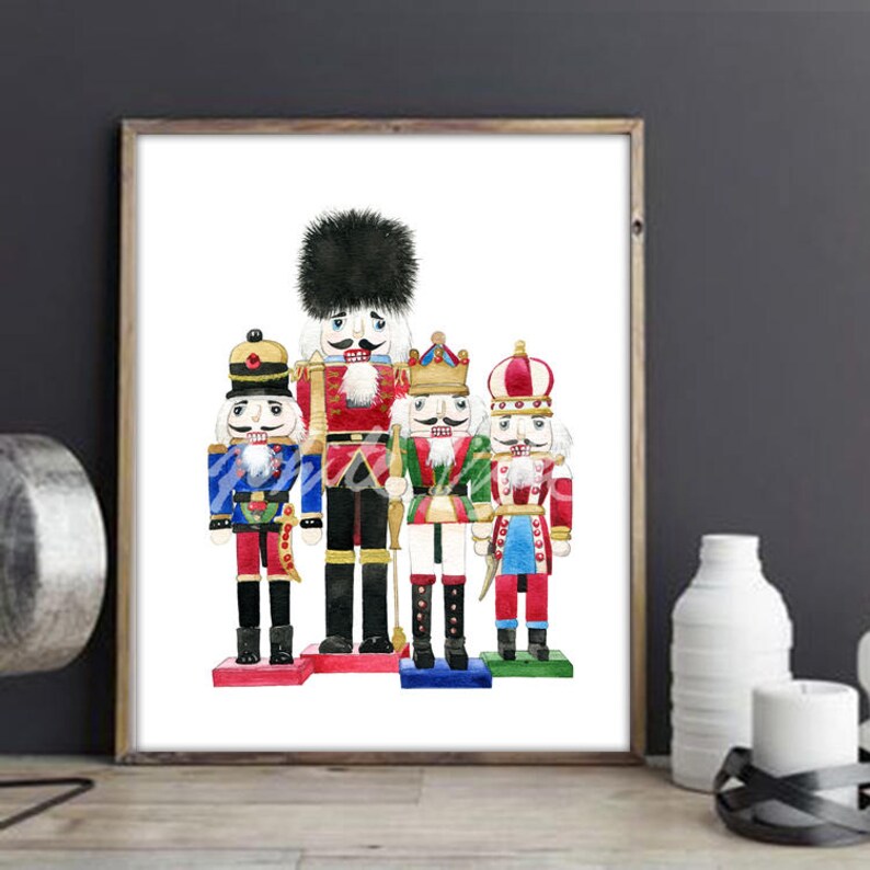May include: A watercolor painting of four nutcracker figurines. The nutcrackers are all wearing different colorful outfits and hats. The nutcrackers are standing on a white background.
