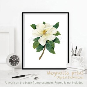 May include: A watercolor painting of a white magnolia flower with green leaves. The flower is in bloom and has a yellow center. The painting is on a white background.