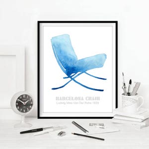 May include: A watercolor illustration of a blue Barcelona chair designed by Ludwig Mies Van Der Rohe in 1929. The chair is depicted in a minimalist style with a white background.