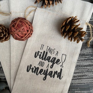 This ‘It Takes a Village and a Vineyard’ canvas wine bottle bag is excellent for jazzing up a gift or adding personality to that wine bottle sitting on your counter. This design is printed on a 100% linen pouch with a jute drawstring.