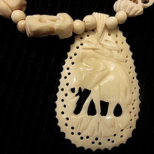 SALE!!!!! Vintage Carved Celluloid Elephant Pendant on Carved Beaded Necklace - c1970s
