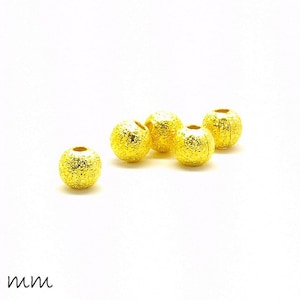 20 pcs metal beads (Stardust) in gold, 4 mm