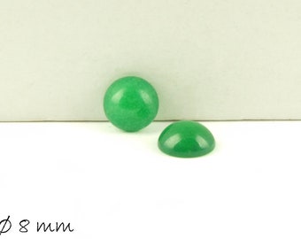 May include: Two green cabochon stones, each measuring 8 mm in diameter. The stones are smooth and have a slightly translucent appearance.