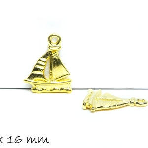 May include: Two gold-colored metal sailboat charms, each measuring 20 mm by 16 mm. The charms are detailed with a sail and a small anchor.