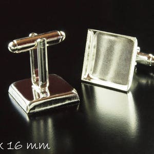 Puede incluir: Un par de gemelos de plata con inserciones cuadradas de vidrio transparente. Las inserciones miden 16 mm x 16 mm.