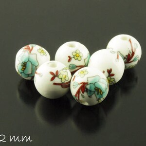 10 stuks porseleinen kralen Ø 12 mm turquoise wit rode bloemen bloemen