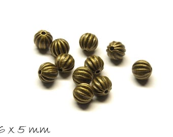 10 pièce x perles Rondelle 6 x 5 mm bronze