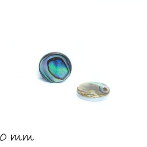 May include: Two abalone shell cabochons, one upright and one flat, displaying iridescent blues, greens, and purples. The round cabochons are approximately 10 mm in diameter, set against a white background.