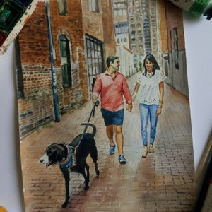 May include: Watercolor painting of a couple walking down a brick alleyway with their dog. The man is wearing a red shirt and black shorts, the woman is wearing a white shirt and blue jeans, and the dog is black with a blue and white collar.