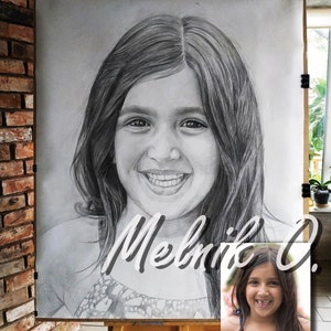 May include: A black and white pencil drawing of a young girl with long hair smiling. The drawing is on a white canvas and is signed "Melnik O."