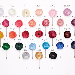 a bunch of different colored lollipops on a stick