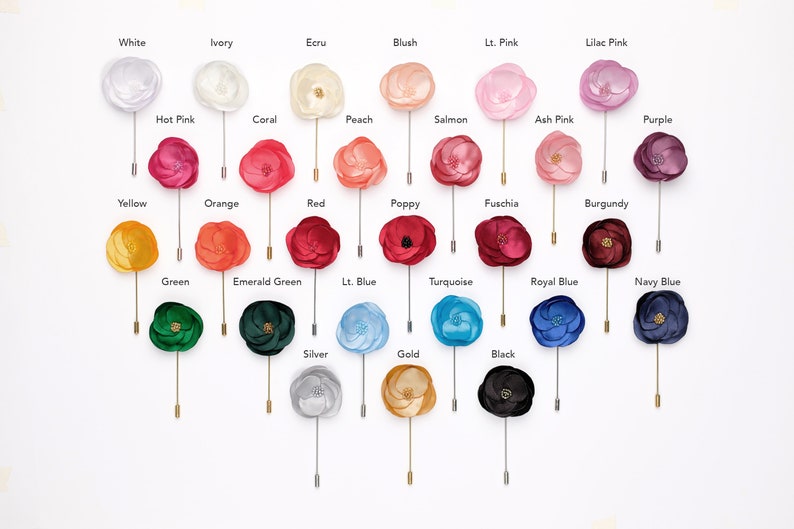 a bunch of different colored lollipops on a stick