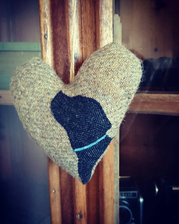 Hand crafted Harris Tweed dog embroidered heart decoration.
