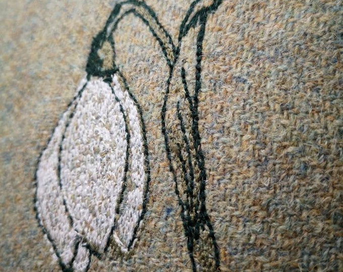 Snowdrop embroidered Harris Tweed cushion cover