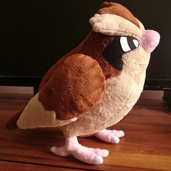 Peluche de ROUCOOL grandeur nature