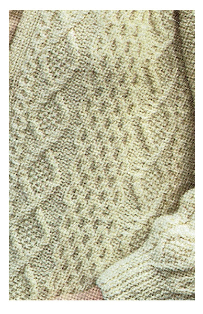 jacket in a Aran cable pattern knitting pattern in PDF form. Ladies long line cardigan