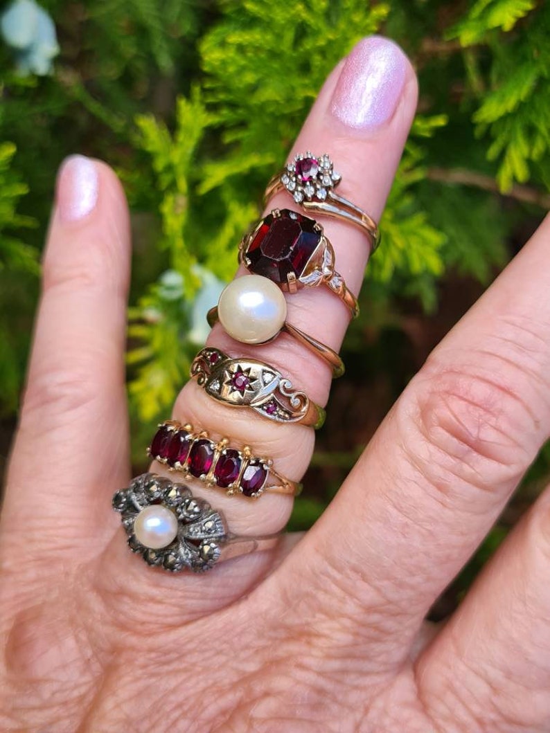 crafted in rose gold Delightful garnet paste ring with floral shoulder detailing