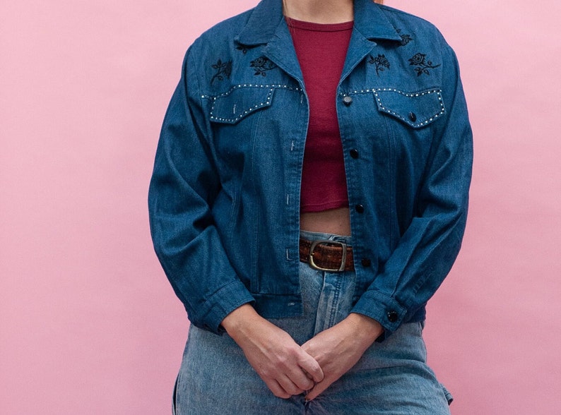 Jean jacket with roses and rhinestone detail