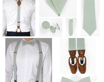 Hosenträger, Fliege, Krawatte und Einstecktuch aus hellem Salbeileinen in salbeigrüner Farbe. Hosenträger aus echtem Leder und Leinenmischung