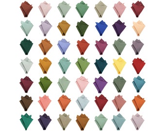 Pochettes de costume en lin aux couleurs vert, rose, violet, orange brûlé, vert sauge. mouchoir en lin jaune, bleu, orange et beige.