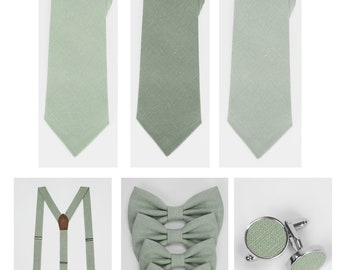 Entdecke unsere Kollektion stilvoller Krawatten aus grünem Leinen, die perfekt zu Hosenträgern, einer Fliege und Manschettenknöpfen passen. In allen Größen erhältlich
