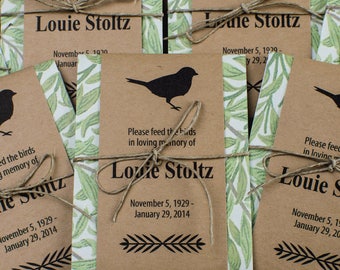 Paquetes de semillas de aves conmemorativas con follaje verde