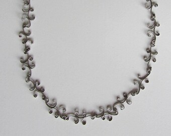 Artisan Necklace Sterling Silver scrolls elegant handmade jewelry silversmith chain