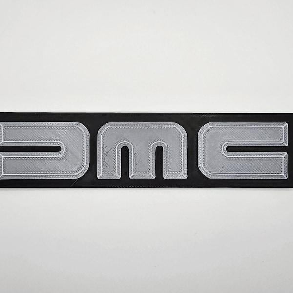 Logo DMC (Delorean Motor Company) en PLA - Impression 3D - Noir et Argent - 211mm