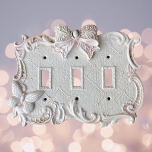 Bow butterfly 3 switch rocker wall light socket cover
