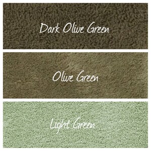 May include: Three fabric swatches in different shades of green. The top swatch is a dark olive green, the middle swatch is a medium olive green, and the bottom swatch is a light green.