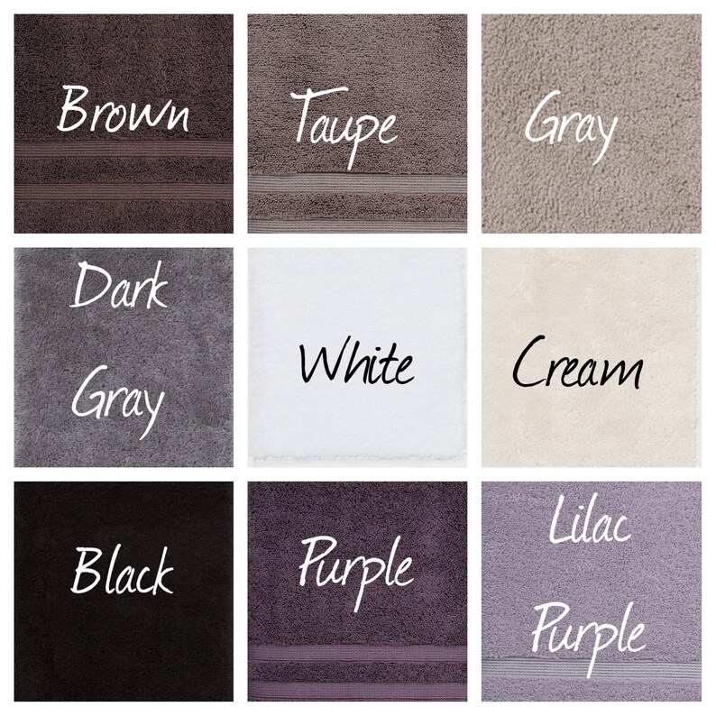 May include: Nine different colored towels, each with a word describing the color written on it. The colors are brown, taupe, gray, dark gray, white, cream, black, purple, and lilac purple.
