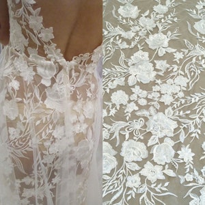 Newest floral wedding dress lace fabric with sequins 130cm width dress lace fabric for bridal dress