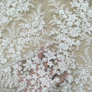 Hot selling bridal flower lace fabric 130cm width french lace wedding dress lace fabric worldwide shipping sell by yard