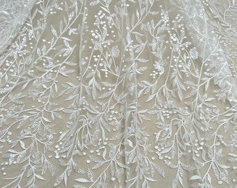 Hot selling fashion bridal wedding lace fabric 130cm width dress lace couture lace ivory fabric 130cm width sell by yard