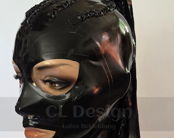 May include: A black latex hood featuring a glossy finish, cutouts for the eyes and mouth, and a high ponytail hairstyle constructed from braided latex strips. The hood displays the text CL Design Latex Bekleidung across the front surface.