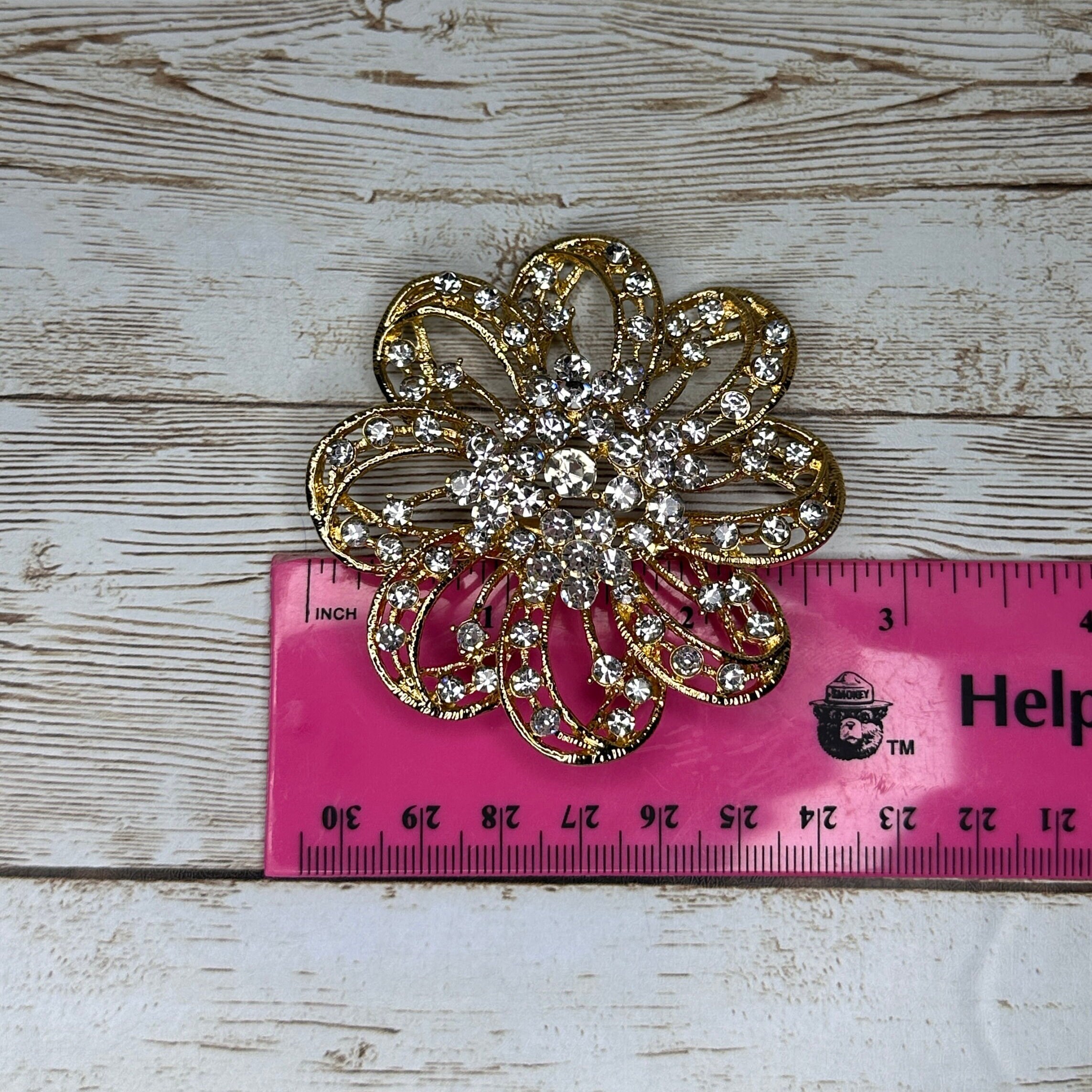 Élégante broche vintage dorée( opéra de Paris ) (D'occasion) à Monthey